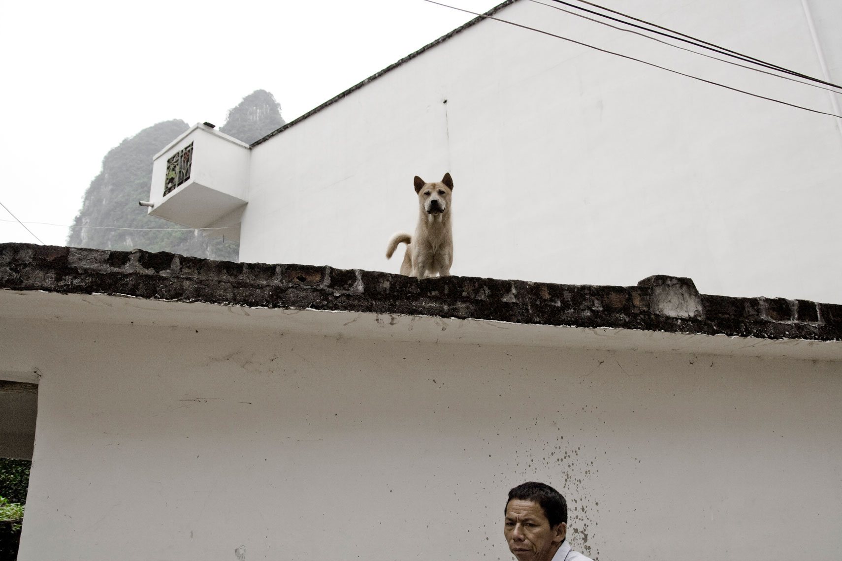 CHINA. Xingping, Guangxi Province, September 2012. Street scene in the village outskirts.